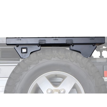 Tablette montée sur la roue de secours