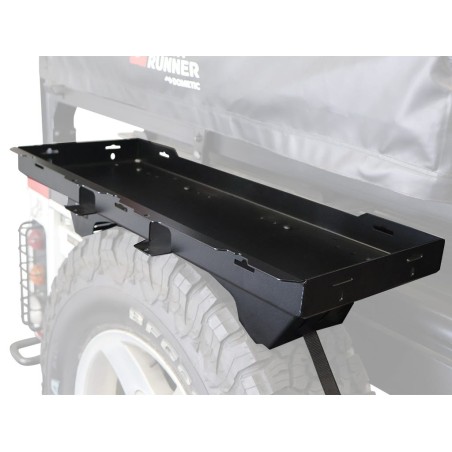 Tablette montée sur la roue de secours