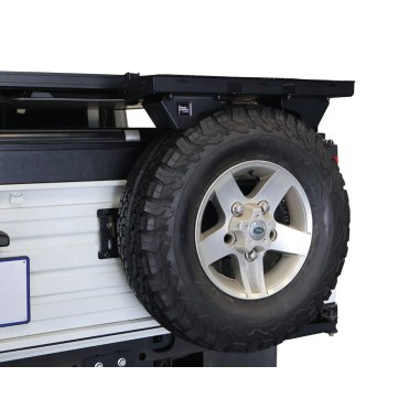 Tablette montée sur la roue de secours